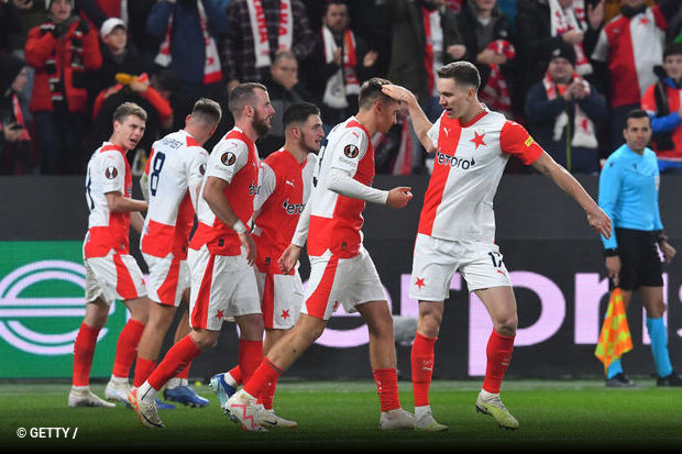 Slavia Praha players celebrate drawing Roma in Europa League group